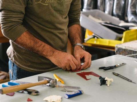 Person working with hand tools